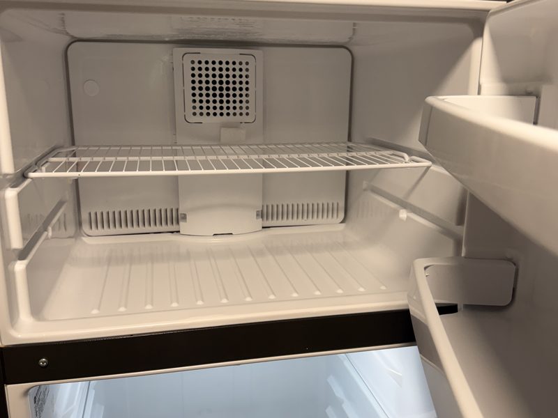 Freezer compartment cleaned during a move-out clean by Ultimate Cleaning Service